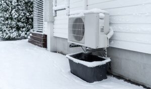 warmtepomp in de sneeuw